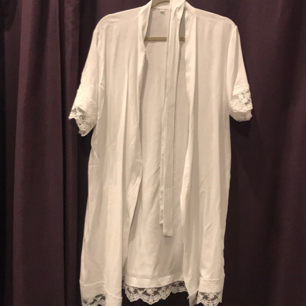 White getting ready rode for wedding / bride